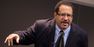 Professor Michael Eric Dyson teaches a sociology course at Georgetown University focusing on rapper Jay-Z, Monday, Nov. 28, 2011, in Washington. (AP Photo/Evan Vucci)